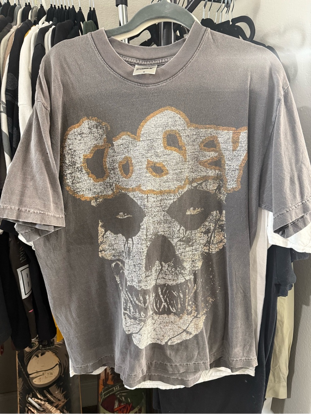 Y2K Faded & Cooked Cosey skull tee with white and gold skull graphic